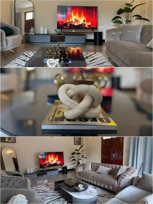 two pictures of a living room with a fireplace at QD Apartment in Arusha